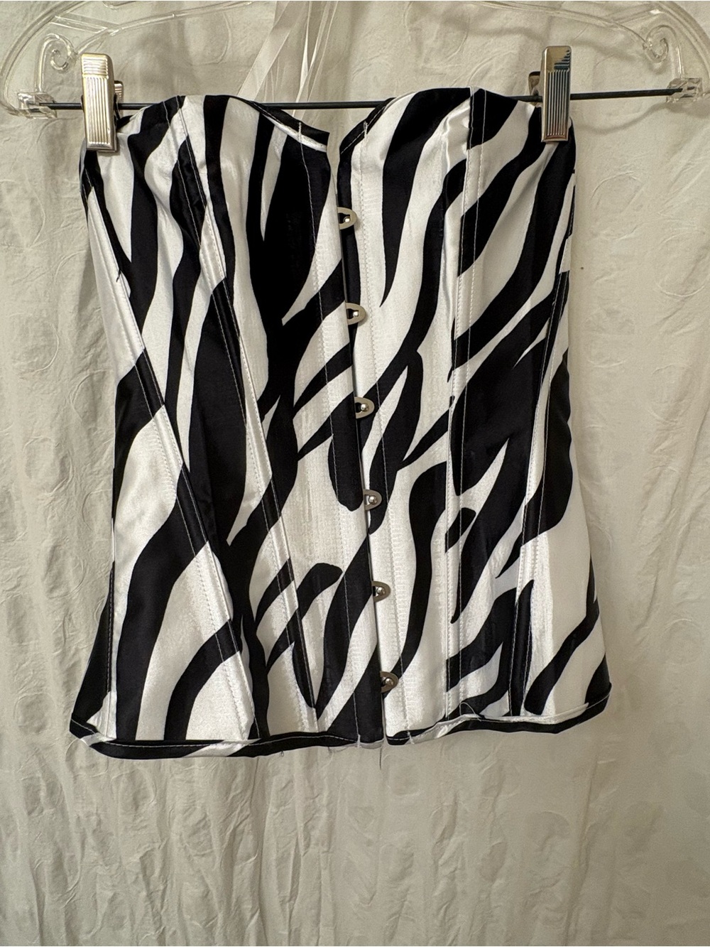 Black and white zebra stripe corset with lace up back. Size medium.